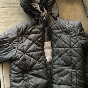 North Face Boys size small reversible winter coat. Very Gently Worn